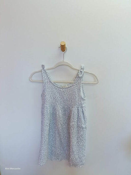 White dress with blue flowers